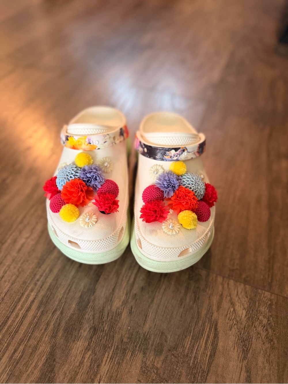 CROCS White Sandals with Red, Orange, Yellow & Purple Floral Accents